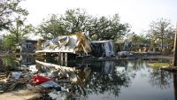 Storm Surge and Hurricane Intensification